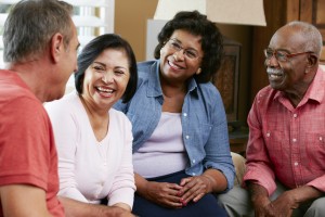 Group Of Senior Friends Chatting About Medicare Advantage